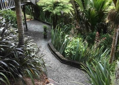 A garden path in Titirangi, Auckland. Looking good after our garden services.